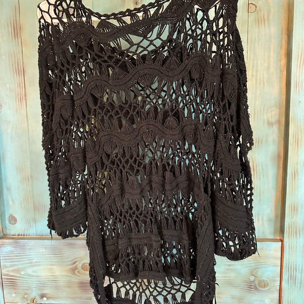 Netted black blouse off the shoulder
